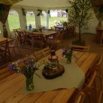 varnished trestle tables, flat ivory interior, for hire