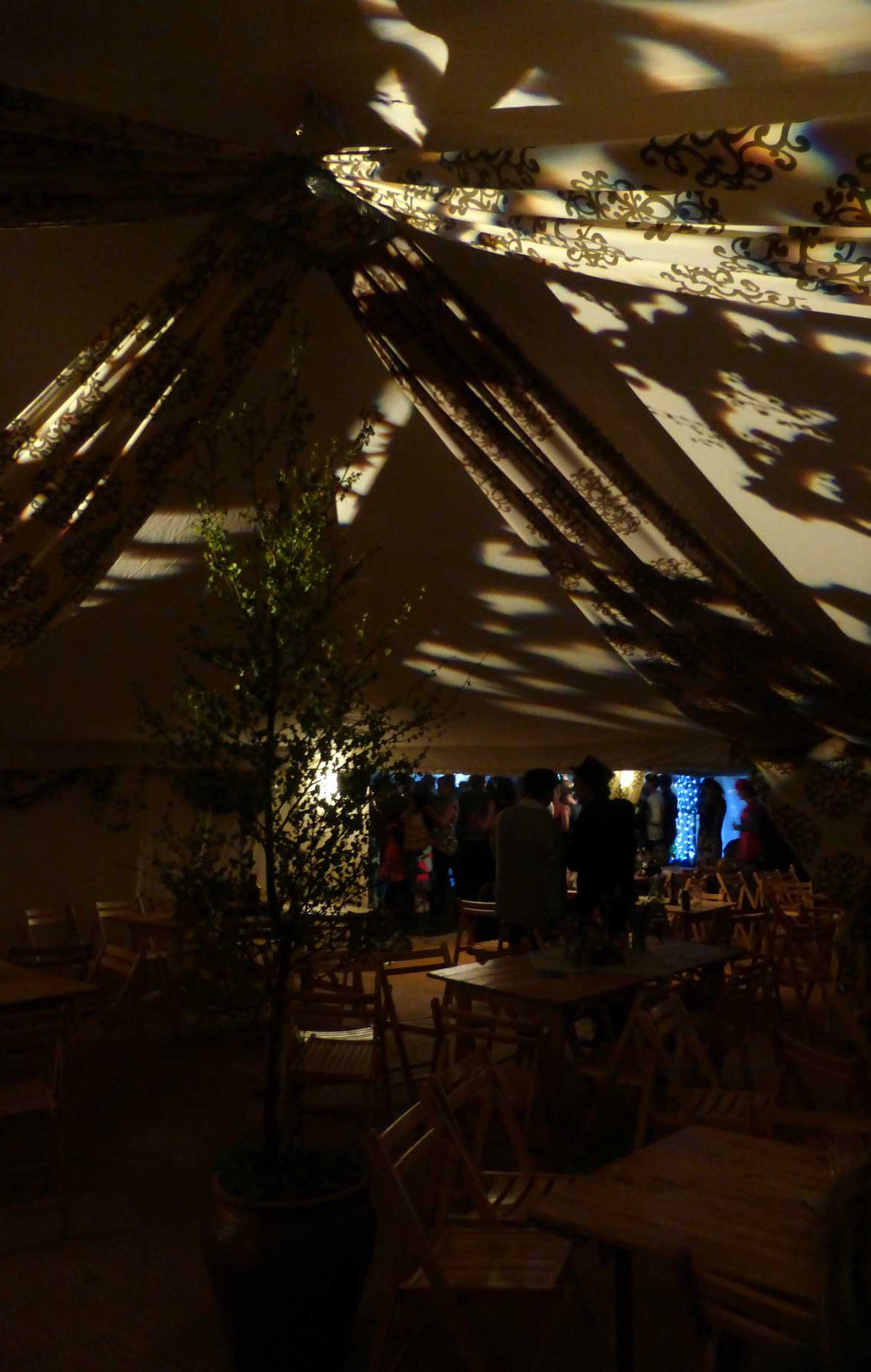 30x30ft modular frame tent, flat ivorylined with patterned effect lighting